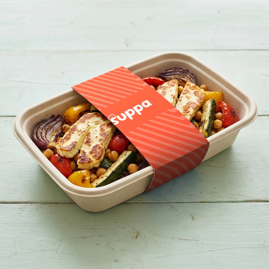 Halloumi and roasted veg traybake packed in a Suppa tray with a orange striped sleeve