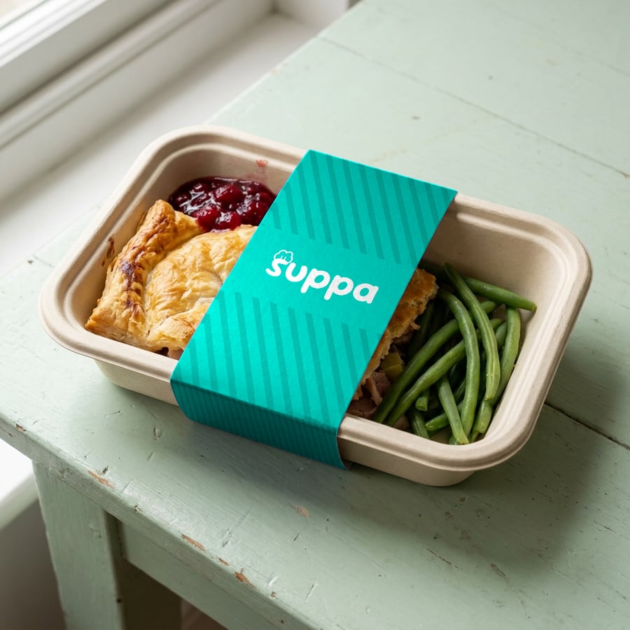 Boxing Day Pie packed in a Suppa tray with a teal striped sleeve