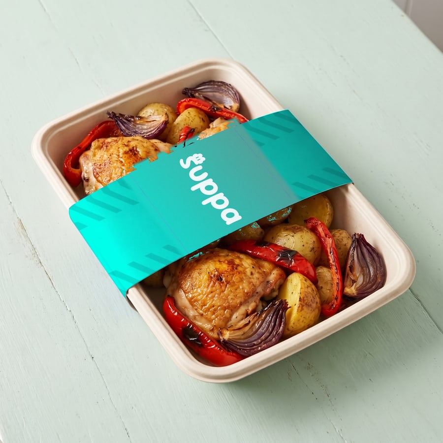 Roast chicken traybake packed in a Suppa tray with a teal striped sleeve